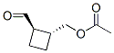 Structure of Cyclobutanecarboxaldehyde, 2-[(acetyloxy)methyl]-, (1R,2R)-